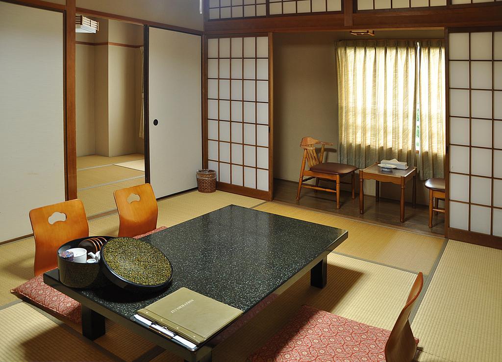 Koyokaku Hotel Урешино Стая снимка