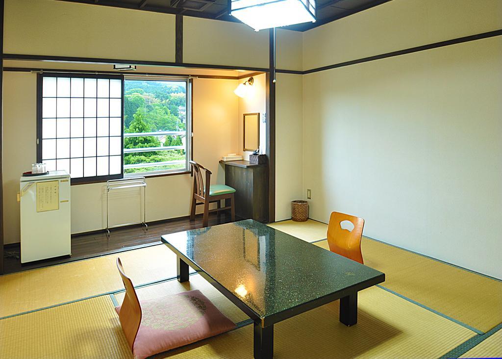 Koyokaku Hotel Урешино Стая снимка
